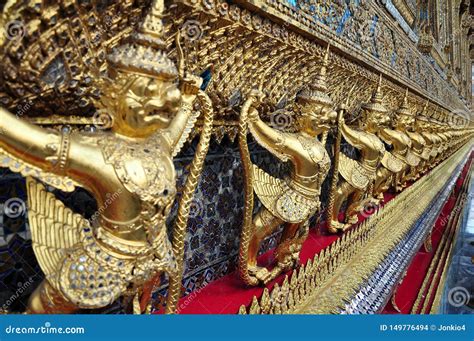 Golden Garuda Figures On Exterior Building Of Wat Phra Kaew Bangkok