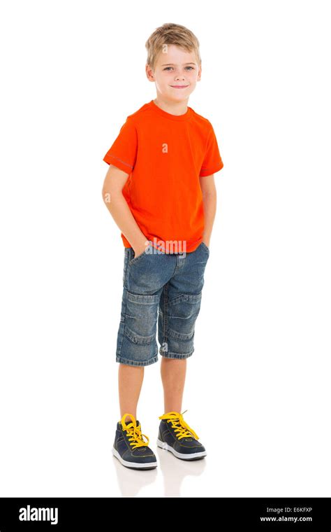 Full Length Portrait Of Little Boy Isolated On White Background Stock