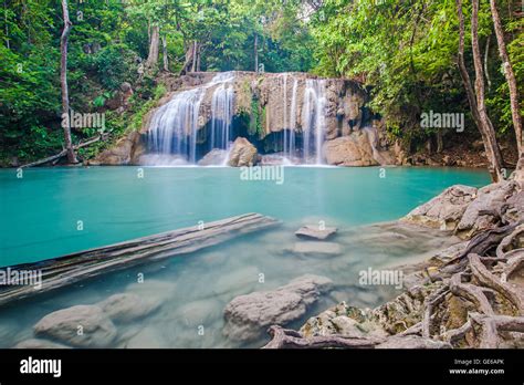 Beautiful Waterfall With Sunlight Rays In Deep Forest Erawan National