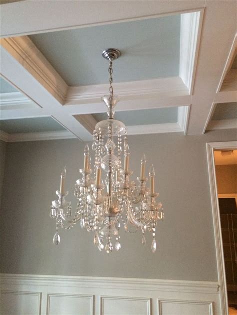 Considering a coffered ceiling in your own abode? Antique chandelier hung from our coffered ceiling. I think ...