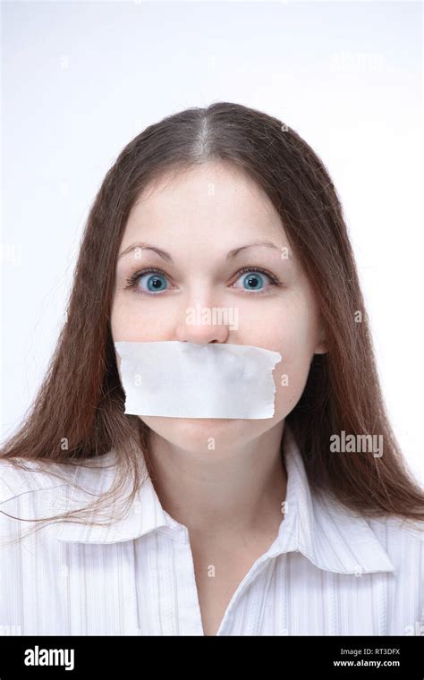 Closeup Young Business Woman With A Taped Mouth Isolated A White