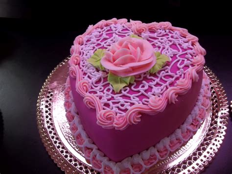 It showcases a perfect sparkling cupcake and words that will. The Birthday cake shaped like a heart wallpapers and ...