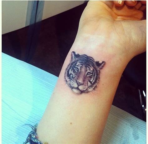 Tiger Tattoo On Wrist Tattoos Girl Tattoos Tiger Face Tattoo