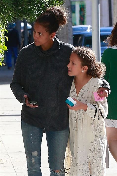 Halle put her fit frame on display in a blush pink atlier versace dress. Halle Berry Takes her growing daughter Nahla Aubry to see ...