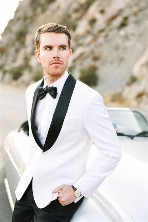 white suit jacket black and white tuxedo black suit wedding groom and groomsmen style