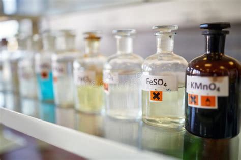 Bottles With Chemicals On The Shelf In The Laboratory Chemistry Lab