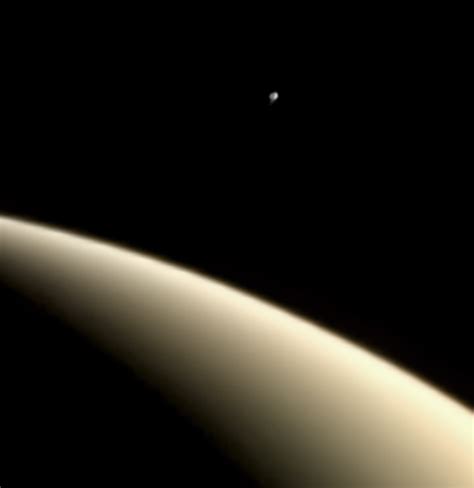 Erupting Enceladus Over Saturn From Voyager The Planetary Society