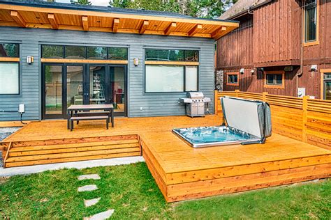 Wood Deck Entertaining Area With Sunken Hot Tub Rustic Deck Calgary By Solkor Creating