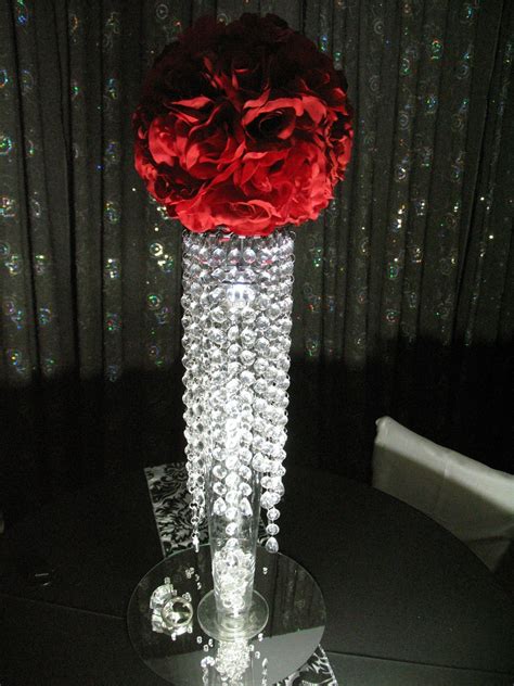 Tall Crystal Vases With Deep Red Roses For Wedding Centerpieces