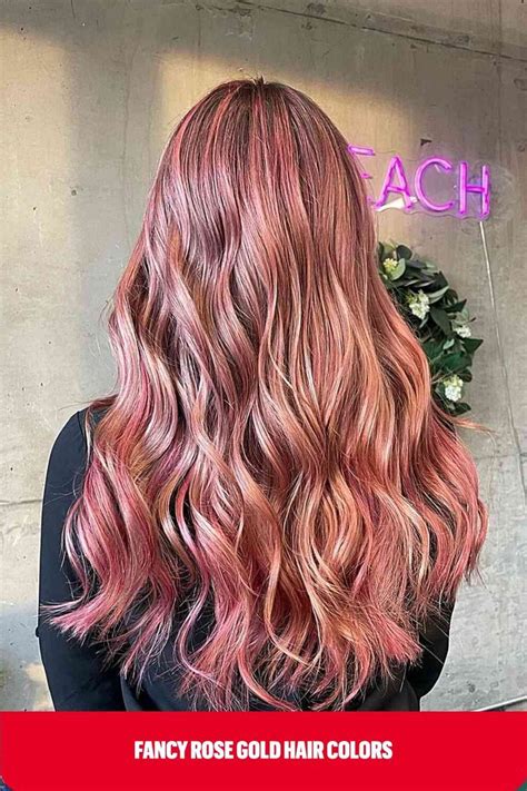 Long Waves With Multi Dimensional Rose Gold Tones And Darker Roots Gold Hair Colors Hair Color