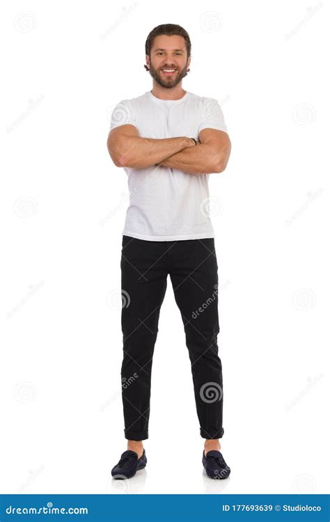 Happy Handsome Man Is Standing With Arms Crossed Front View Stock