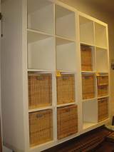 Black Storage Shelves With Rattan Baskets Photos