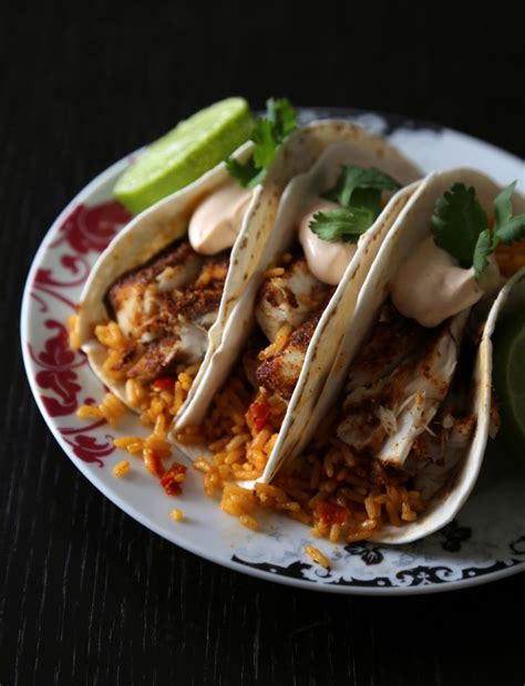 Well, here we are smack dab right in the middle of winter. spiced barramuni tacos with spanish rice & chipotle cream ...