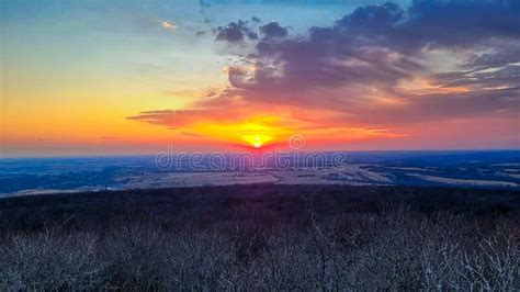 Colorful Sky Through The Trees At Blue Mounds State Park At The Sunset