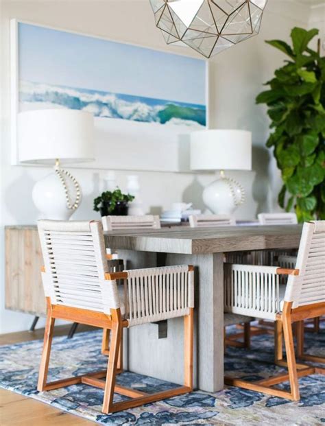 Ours are designed with the right proportions to be comfortable to sit in until dessert. Love these rope dining chairs in this coastal dining room ...