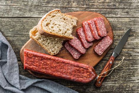 Smoked Sausage Sliced Salami On Cutting Board Top View Stock Image