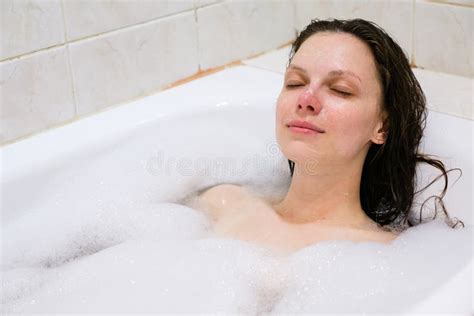 Young Beautiful Girl In A Bath With Foam Stock Image Image Of Cleansing Candles 102255423