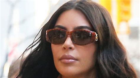 Kim Kardashian Looks Glum In A Snakeskin Coat As She Takes North And