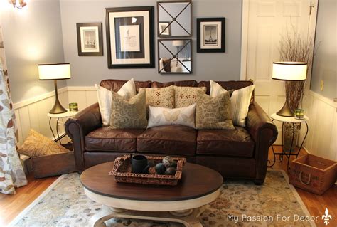 A black ottoman, matching the sofa's leather, could also be placed in front of both brown chairs. My Passion For Decor: Our New Addition!