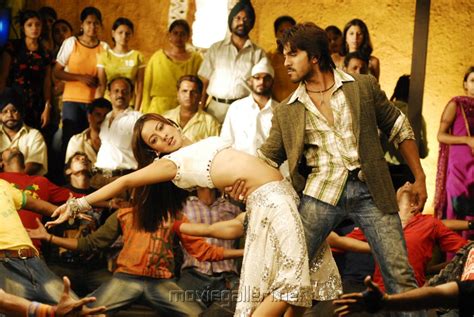 Siruthai Puli Movie Stills Ram Charan Teja Neha Sharma