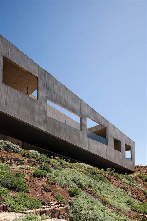 Chilean Concrete Residence Adorning A Steep Slope Bahia Azul House