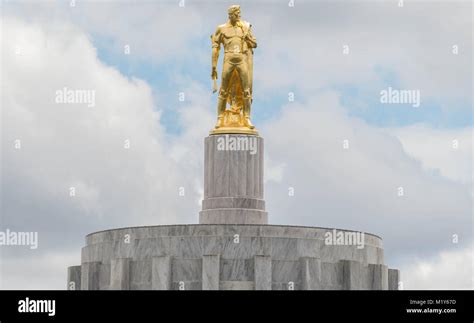 Gold Oregon Pioneer atop the Capitol Building in Salem Stock Photo - Alamy