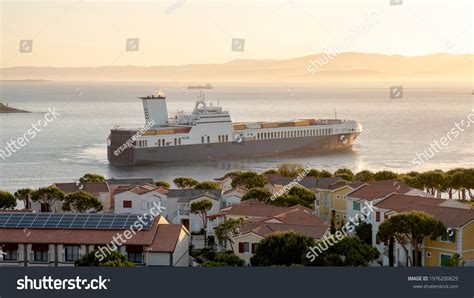 Cargo Ship Cruising Sunset Offers Beautiful Stock Photo 1976200829