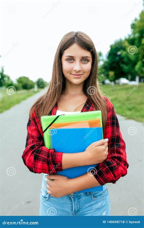 Girl Schoolgirl Teenager 10 15 Years Old Summer City After School Lessons In Hands Documents