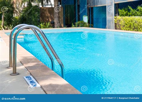 Ladder Stainless Handrails For Descent Into Swimming Pool Stock Image