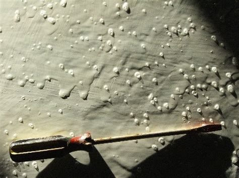 The source of air bubbles in polycrylic finish may be dust or some other foreign matter on the surface and/or overworking the application process. Epoxy Floor Garage Paint Problems Guide