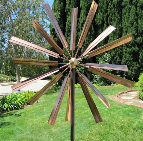 Metal garden art can be whimsical, playful or or even formal. Stanwood Wind Sculpture: Kinetic Copper Dual Spinner ...