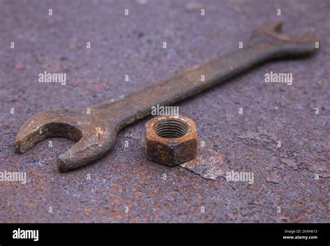 Old Wrench And Nut On A Rusty Countertop Stock Photo Alamy
