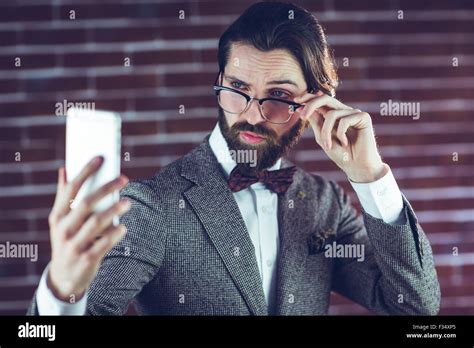 Stylish Man Taking Picture Of Himself Stock Photo Alamy