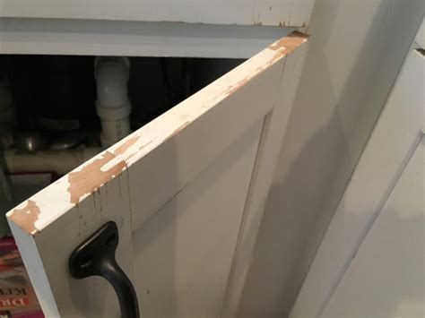 I am getting quotes to have my kitchen painted but have run into a dilemma about technique. Repair Chipped Paint on Kitchen Cabinets