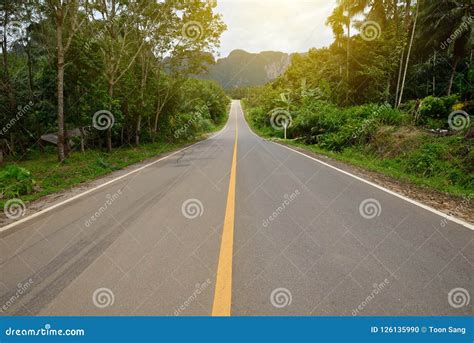 Perspective View Of A Long Mountain Road Stock Photo Image Of Asphalt