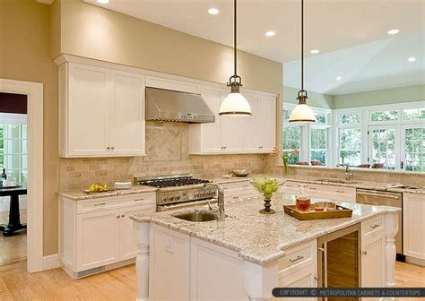 Maybe you would like to learn more about one of these? Bianco romano granite countertop beige kitchen cabinets ...