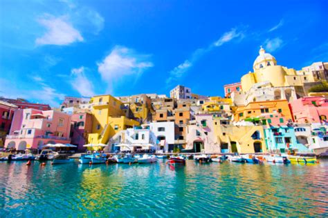 Naples will give you a true taste of italy — thanks to its winding cobblestone streets, authentic pizza and real italian flavor. Water View Of Colorful Procida In Naples Italy Stock Photo ...