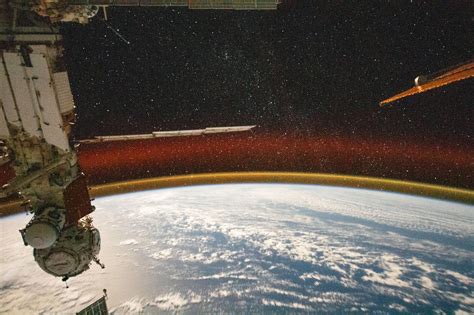 International Space Station Captures Mesmerizing Golden Airglow Above Earth S Horizon Science
