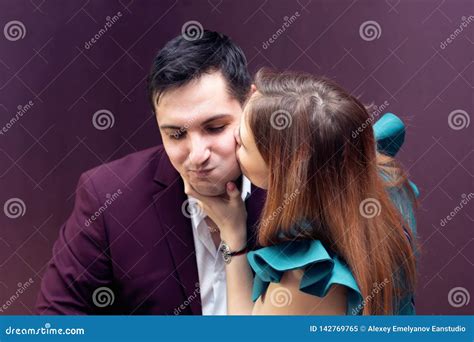 Wife Kisses Her Husband On The Cheeks Stock Image Image Of Happy Romance 142769765