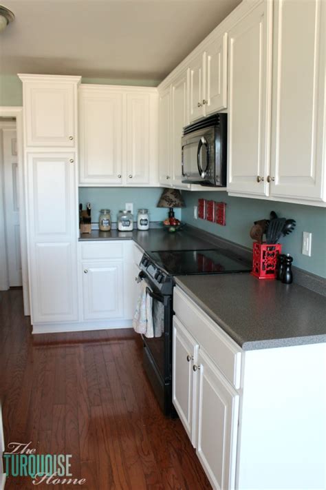 In the washington dc area, it costs about $3200 on average to have your cabinets professionally painted. Painted Kitchen Cabinets with Benjamin Moore Simply White