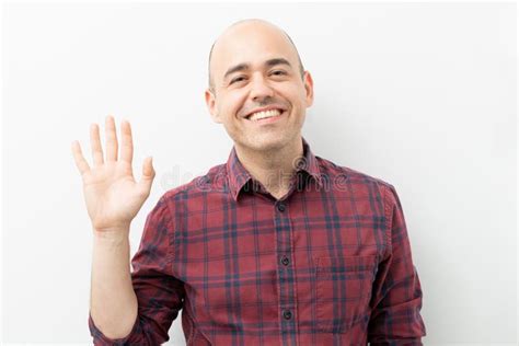 Man Waving Hello With His Hand And A Smile Stock Photo Image Of Hand