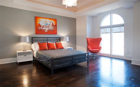 It's a place where teens do homework, hang with friends, express themselves, and corkboards or magnetic boards allow teens to display their pictures, artwork, notes, and more without ruining their bedroom walls. Orange and Gray Modern Bedroom