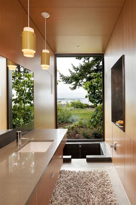 <p>breathtakingly beautiful japanese tiny house on wheels. A Sunken Bathtub Is A Creative Feature In This Master Bathroom