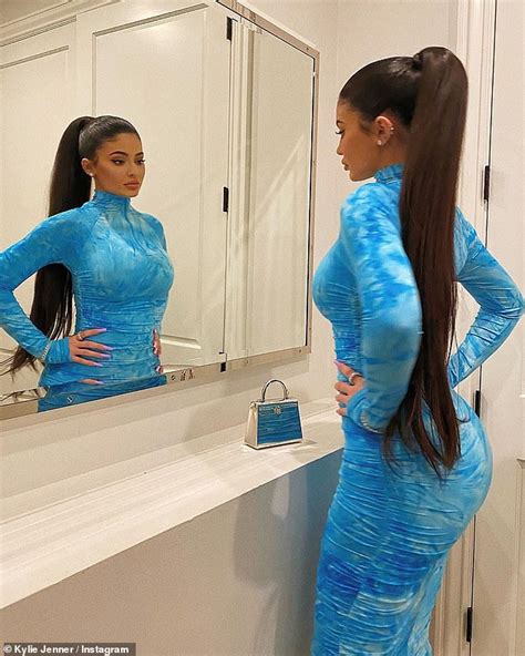 Kylie Jenner Flaunts Curvaceous Figure In Clinging Aqua Dress For Family Dinner At Nobu In