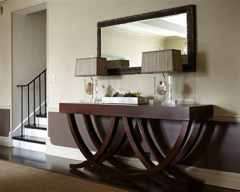 Upgrade your home decor with this bold modern console table. Decorate Unique Console Tables | Console table decorating, Unique console table, Modern entryway ...