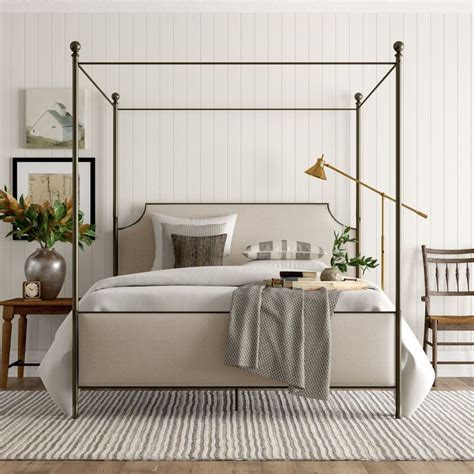 A canopy bed is perhaps not the most trendy furniture piece to rock but you can really make it bold a white upholstered bed with a chic metallic canopy frame looks cohesive in this bold and quirky. Kingsview Upholstered Canopy Bed | Joss & Main | Chic ...