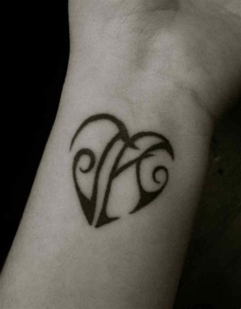 40 Stylish Wrist Initials Tattoos