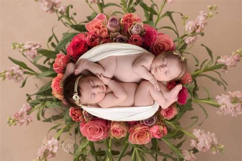 Twins Girl Photo Shoot With A Floral Background Newborn Twin Photos