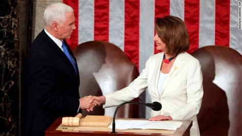 pence and pelosi share a bipartisan handshake