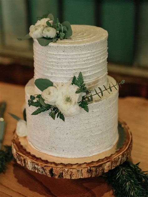 Check spelling or type a new query. Simple white two tier wedding cake with florals. Matcha wedding cake with black sesame frosting ...